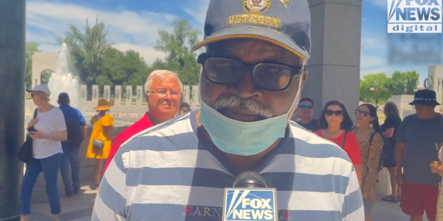 Nate, a Navy veteran, tells G3 Box News why he loves America. (G3 Box News Digital/ Jon Michael Raasch)