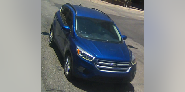 Police are searching for this 2019 blue Ford Escape that was used during the robbery and kidnapping.