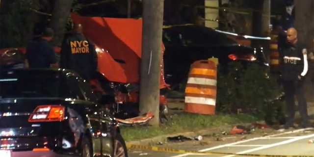 New York City Mayor Eric Adams visits the scene where a fatal car accident left three people dead and several others injured on July 10, 2022.