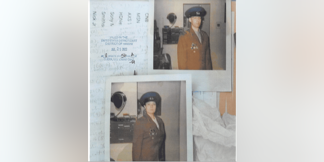 Polaroid photos of Walter Primrose and Gwynn Morrison in KGB uniforms shared in court.