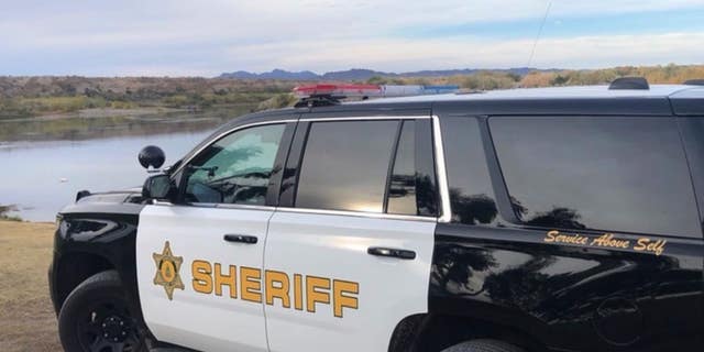 FILE- A Riverside County Sheriff's Department cruiser is pictured near a body of water.