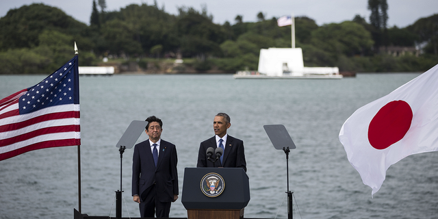Japan's Shinzo Abe met with US Presidents Bush, Obama, Trump in years as prime minister 3 U.S. President Barack Obama delivers remarks while Japanese Prime Minister Shinzo Abe listens at Joint Base Pearl Harbor Hickam's Kilo Pier on December 27, 2016 in Honolulu, Hawaii. Abe is the first Japanese prime minister to visit Pearl Harbor with a U.S. president and the first to visit the USS Arizona Memorial.