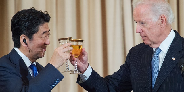 Then-Vice President Joe Biden toasting Prime Minister of Japan Shinzo Abe at the State Department in Washington on April 28, 2015.