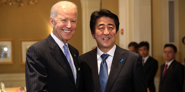 FILE - Vice President Joe Biden meets with Japanese Prime Minister Shinzo Abe on Sept. 26, 2014, in New York City. 