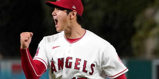Los Angeles Angels starting pitcher Shohei Ohtani celebrates after striking out the Houston Astros' J.J. Matijevic to end the top of the sixth inning of a game July 13, 2022, in Anaheim, Calif. 