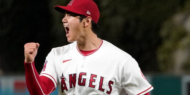 Los Angeles Angels starting pitcher Shohei Ohtani celebrates after striking out Houston Astros' J.J. Matijevic to end the top of the sixth inning on Wednesday, July 13, 2022, in Anaheim, Calif. 