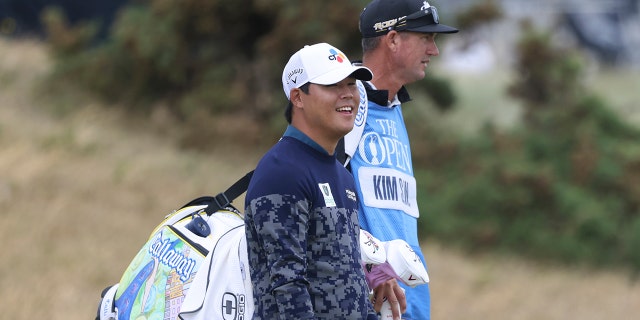 South Korea's Si Woo Kim on the 17th hole during a practice round at the British Open golf championship on the Old Course at St. Andrews, Scotland, on July 12, 2022.