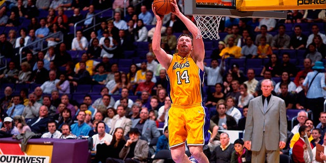 Stanislav Medvedenko, #14 of the Los Angeles Lakers, goes up for a shot against the Vancouver Grizzlies at the Staples Center on Jan. 15, 2001.