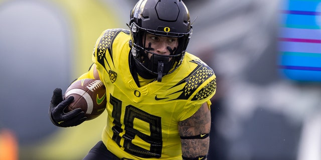 Spencer Webb of the Oregon Ducks runs with the ball against the Colorado Buffaloes on Oct. 30, 2021 at Autzen Stadium in Eugene, Oregon.