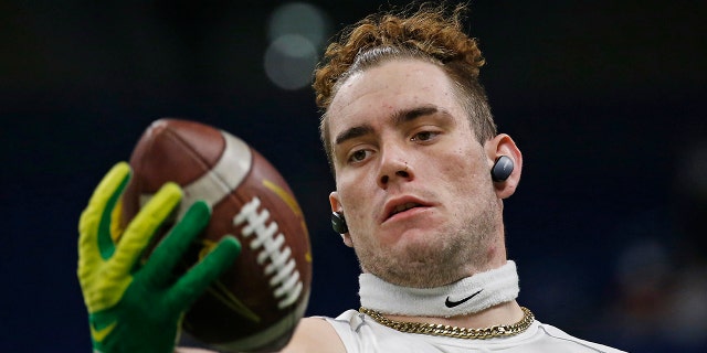 Spencer Webb of the Oregon Ducks catches a pass before the start of a game against the Oklahoma Sooners in the Valero Alamo Bowl at the Alamodome Dec. 29, 2021, in San Antonio, Texas.