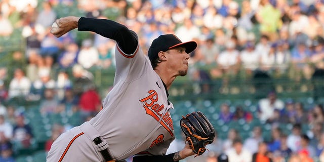 Baltimore Orioles starting pitcher Spenser Watkins delivers during the first inning of the team's baseball game against the Chicago Cubs on Wednesday, July 13, 2022, in Chicago. 