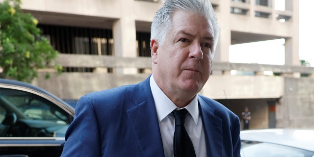 M. Evan Corcoran, a lawyer of former U.S. President Donald Trump's White House chief strategist Steve Bannon arrives following his client's trial on contempt of Congress charges for his refusal to cooperate with the U.S. House Select Committee investigating the Jan. 6, 2021 attack on the Capitol, at U.S. District Court in Washington, U.S., July 22, 2022. 