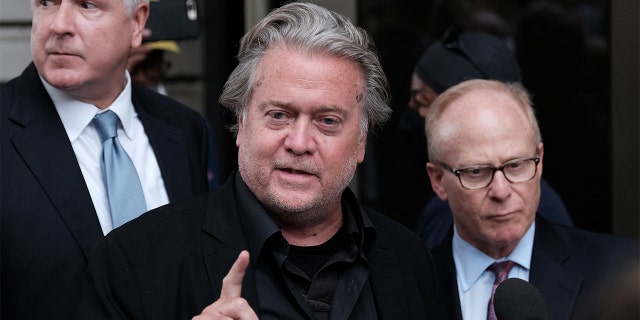 Former Trump White House chief strategist Steve Bannon speaks with the media at the end of the opening day of his trial on contempt of Congress charges stemming from his refusal to cooperate with the U.S. House Select Committee investigating the January 6, 2021 attack on the Capitol, at U.S. District Court in Washington, July 21, 2022. 