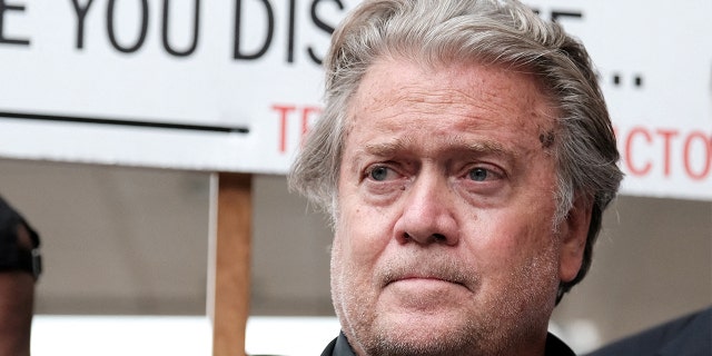 Former Trump White House chief strategist Steve Bannon speaks with the media during the opening day of his trial on contempt of Congress charges stemming from his refusal to cooperate with the U.S. House Select Committee investigating the January 6, 2021 attack on the Capitol, at U.S. District Court in Washington, July 21, 2022. 