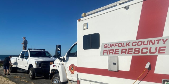 A Suffolk County Fire Rescue and Emergency Services vehicle near the beach