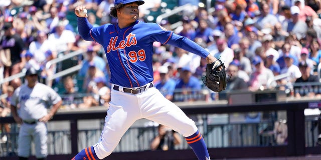 New York Mets pitcher Taijuan Walker delivers against the Miami Marlins during the first inning of a baseball game, Sunday, July 10, 2022, in New York.