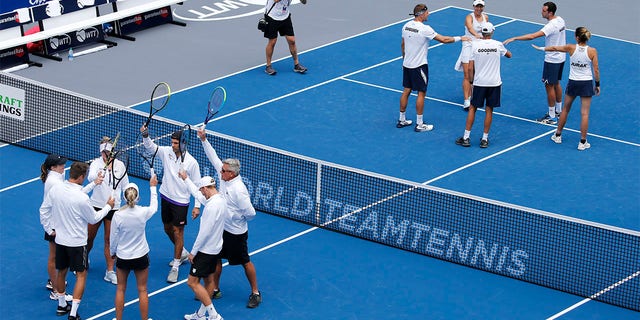 The Springfield Lasers, left, and Orlando Storm, right, are introduced at the start of the World Teamtennis tournament at an empty tennis arena at The Greenbrier Resort on July 12, 2020, in White Sulphur Springs, W.Va.  World TeamTennis, the mixed-gender league co-founded nearly a half-century ago by Billie Jean King, will not have a season in 2022 but plans to return next year, the league announced Wednesday, July 20, 2022 