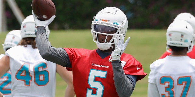 Teddy Bridgewater, #5 of the Miami Dolphins, throws the ball during the Miami Dolphins Mandatory Minicamp at the Baptist Health Training Complex on June 7, 2022 in Miami Gardens, Florida.
