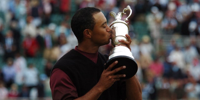 Tiger Woods of the United States kisses the Claret Jug following his victory during The 134th Open Championship held on the Old Course at St Andrews, from July 14-17, 2005 in St Andrews, Scotland.