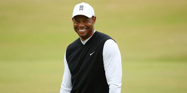 Tiger Woods of The United States reacts on the 18th during the Celebration of Champions Challenge during a practice round prior to The 150th Open at St Andrews Old Course on July 11, 2022 in St Andrews, Scotland. 