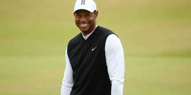 Tiger Woods of The United States reacts on the 18th during the Celebration of Champions Challenge during a practice round prior to The 150th Open at St Andrews Old Course on July 11, 2022 in St Andrews, Scotland.