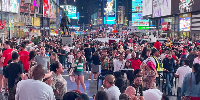 There are rules that govern how you can carry a gun through Times Square. 