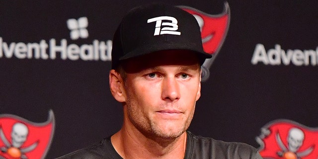 Tom Brady, #12 of Tampa Bay Buccaneers, answers questions at a press conference following the 2022 Buccaneers minicamp at AdventHealth Training Center on June 09, 2022 in Tampa, Florida.