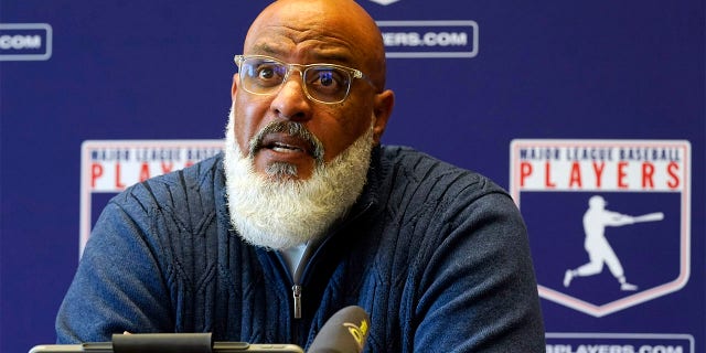 Tony Clark, Executive Director of the Major League Baseball Players Association, answers questions during a press conference in New York City, March 11, 2022.