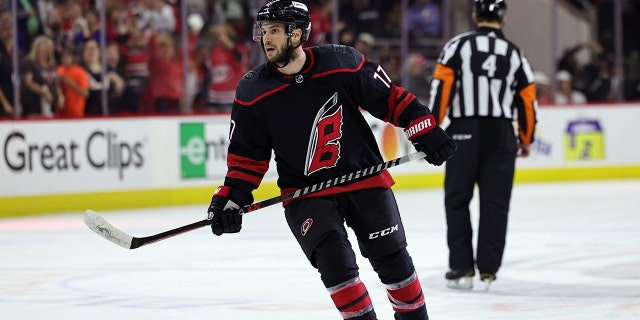 Tony DeAngelo of the Carolina Hurricanes scores a goal in Game 7 of the second round of the 2022 Stanley Cup playoffs against the New York Rangers May 30, 2022, at PNC Arena in Raleigh, N.C.