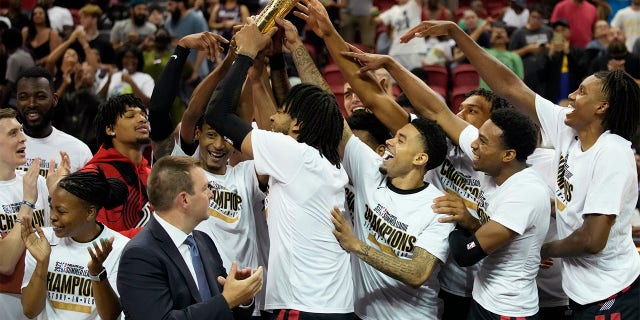 Portland Trail Blazers celebrate after defeating the New York Knicks in an NBA summer league championship basketball game Sunday, July 17, 2022, in Las Vegas.
