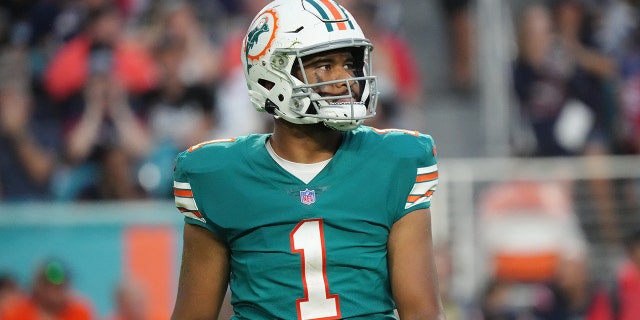 Tua Tagovailoa of the Miami Dolphins in action against the New England Patriots at Hard Rock Stadium Jan. 9, 2022, in Miami Gardens, Fla.