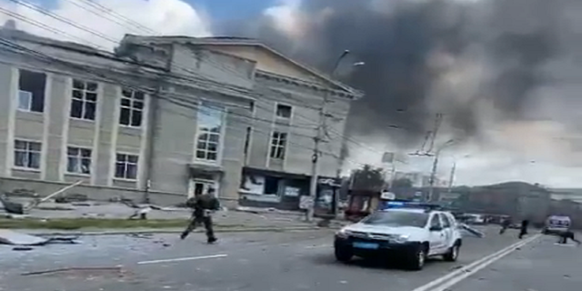 Debris is seen scattered amongst a street in Vinnystia, Ukraine, following a Russian military airstrike Thursday.