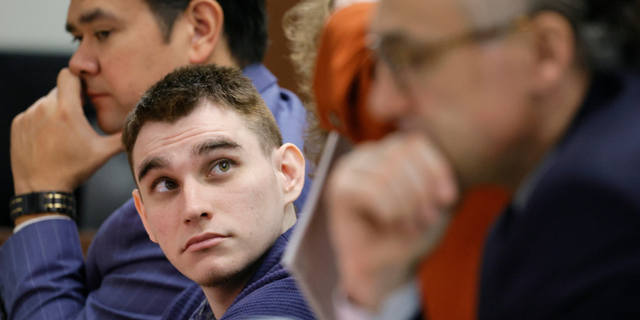 Marjory Stoneman Douglas High School shooter Nikolas Cruz sits at the defense table during jury selection in the penalty phase of his trial at the Broward County Courthouse in Fort Lauderdale, Fla., on Wednesday, June 29, 2022. The judge has refused to delay the sentencing trial of Cruz in the 2018 shooting at a high school in which 17 people were killed. 