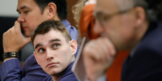 Marjory Stoneman Douglas High School shooter Nikolas Cruz sits at the defense table during jury selection in the penalty phase of his trial at the Broward County Courthouse in Fort Lauderdale, Fla., on Wednesday, June 29, 2022. The judge has refused to delay the sentencing trial of Cruz in the 2018 shooting at a high school in which 17 people were killed. 