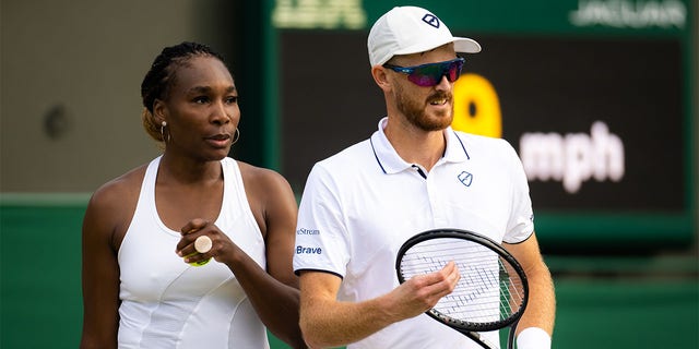 Venus Williams of the United States and Jamie Murray of Great Britain in action against Jonny OMara of Great Britain and Alicia Barnett of Great Britain in their second round mixed doubles match during Day Seven of The Championships Wimbledon 2022 at All England Lawn Tennis and Croquet Club on July 03, 2022 in London, England 