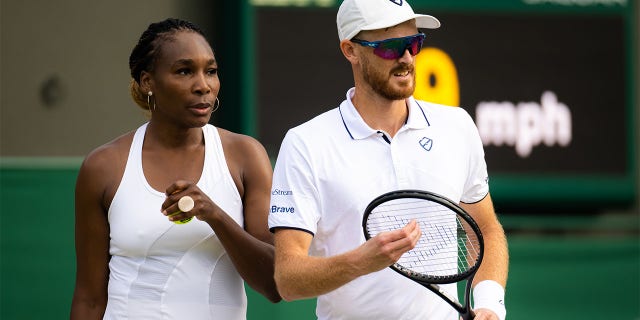 Venus Williams of the United States and Jamie Murray of Great Britain in action against Jonny OMara of Great Britain and Alicia Barnett of Great Britain in their second round mixed doubles match during Day Seven of The Championships Wimbledon 2022 at All England Lawn Tennis and Croquet Club on July 03, 2022 in London, England 