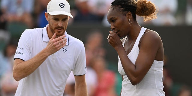 Venus Williams of The United States and partner Jamie Murray of Great Britain interact during their Mixed Doubles Second Round match against Alicia Barnett of Great Britain and Jonny O'Mara of Great Britain on day seven of The Championships Wimbledon 2022 at All England Lawn Tennis and Croquet Club on July 03, 2022 in London, England. 