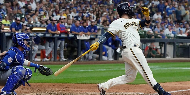 Milwaukee Brewers' Victor Caratini hits a walk off three run home run during the 10th inning of a baseball game against the Chicago Cubs Monday, July 4, 2022, in Milwaukee.