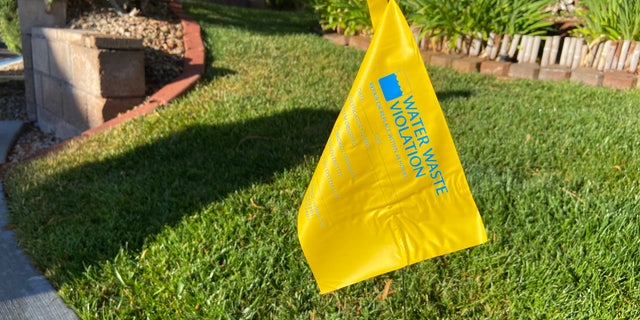 Las Vegas water patrol teams hunt for violations.  They issue more warnings with yellow flags planted in the ground than they do citations or fines.