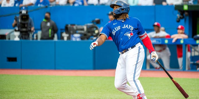 Toronto Blue Jays first baseman Vladimir Guerrero Jr. (27) looks on after hitting a two-run home run during the first inning of a baseball game against the St. Louis Cardinals, Tuesday, July 26, 2022 in Toronto.