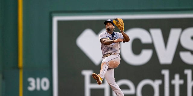 Wander Franco #5 of the Tampa Bay Rays throws during the third nning of a game against the Boston Red Sox on July 6, 2022 at Fenway Park in Boston, Massachusetts. 