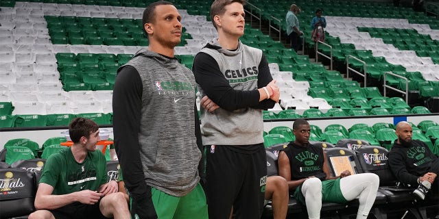 Assistant Coaches, Joe Mazzulla and Will Hardy of the Boston Celtics talk before Game Three of the 2022 NBA Finals on June 8, 2022 at the TD Garden in Boston, Massachusetts.