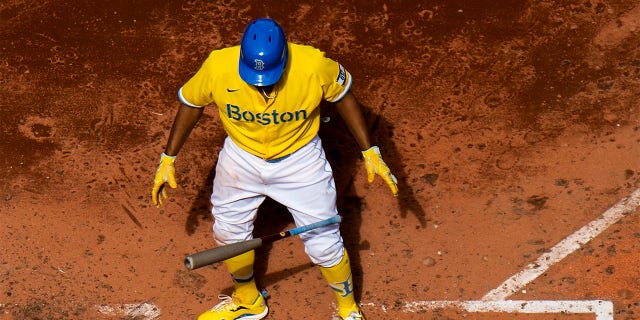 Xander Bogaerts #2 of the Boston Red Sox bats as he wears the Nike City Connect jersey during the sixth inning of a game against the Chicago White Sox on April 18, 2021 at Fenway Park in Boston, Massachusetts.