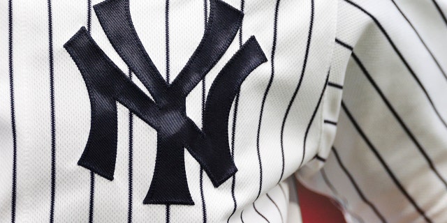 A New York Yankees logo.