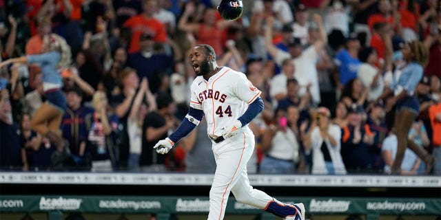 Houston Astros designated hitter Yordan Alvarez (44) celebrates after his walkoff home run during the ninth inning of a baseball game against the Kansas City Royals, Monday, July 4, 2022, in Houston. 