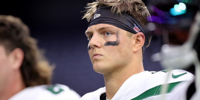 Zach Wilson, #2 of the New York Jets, looks on before the game against the Houston Texans at NRG Stadium on November 28, 2021 in Houston, Texas.