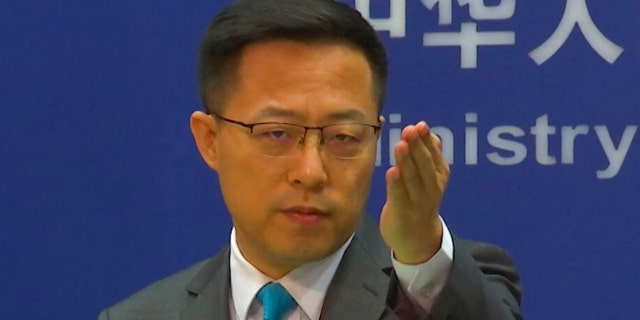 Chinese Foreign Ministry spokesperson Zhao Lijian gestures during a press conference at the Ministry of Foreign Affairs in Beijing on Wednesday, July 6, 2022.
