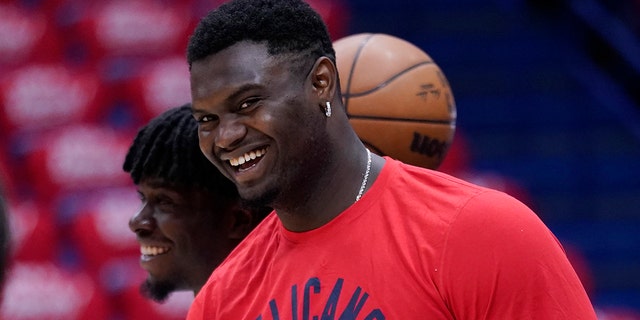 FILE - New Orleans Pelicans forward Zion Williamson watches a shoot-around before Game 6 of the team's NBA basketball first round playoff series against the Phoenix Suns on April 29, 2022 in New Orleans. 