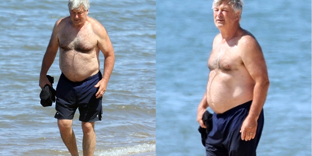 Alec Baldwin walks shirtless on the beach in The Hamptons, New York.