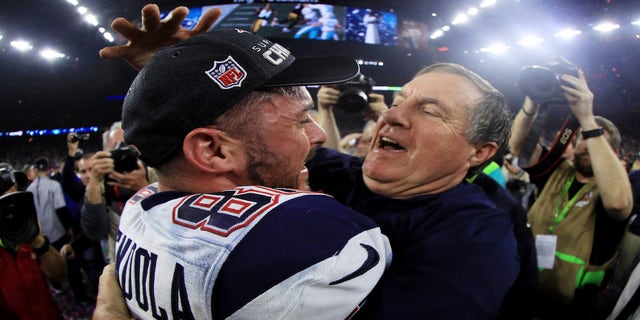 Danny Amendola #80 and head coach Bill Belichick of the New England Patriots celebrate after defeating the Atlanta Falcons 34-28 in overtime during Super Bowl 51 at NRG Stadium on Feb. 5, 2017 in Houston, Texas.
